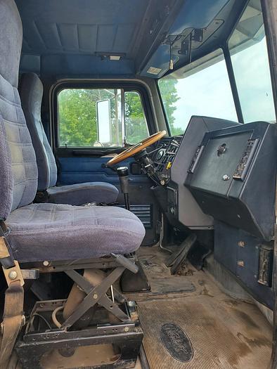 Used 1990 Peterbilt w/ New Holland 1051 Stack Retriever