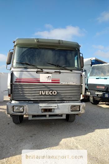 Used 1990 Iveco Turbostar 190-36 6X2 flatbed truck.