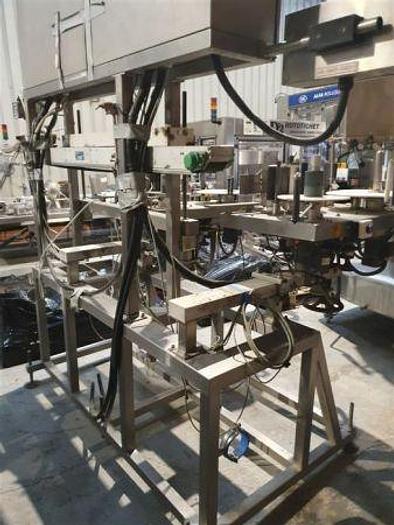 Used 2002 Graham Captain Twin Head Labeller with Top Hold Conveyor