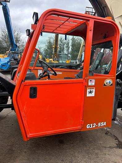 Used UPPER AND LOWER GENUINE FACTORY JLG DOOR