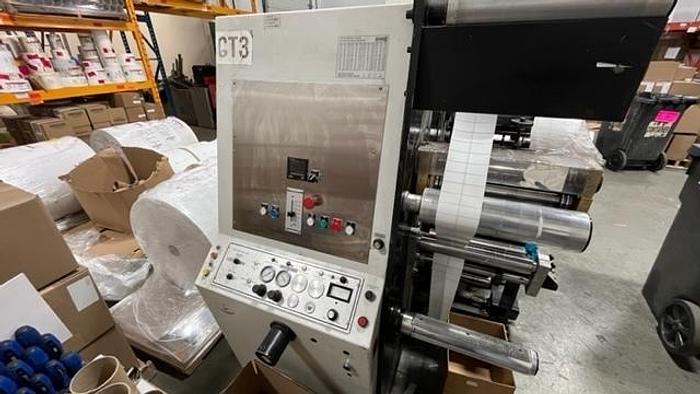 Used 13" WIDE ROTOFLEX SLITTER REWINDER WITH 2 STATION DIE CUTTING