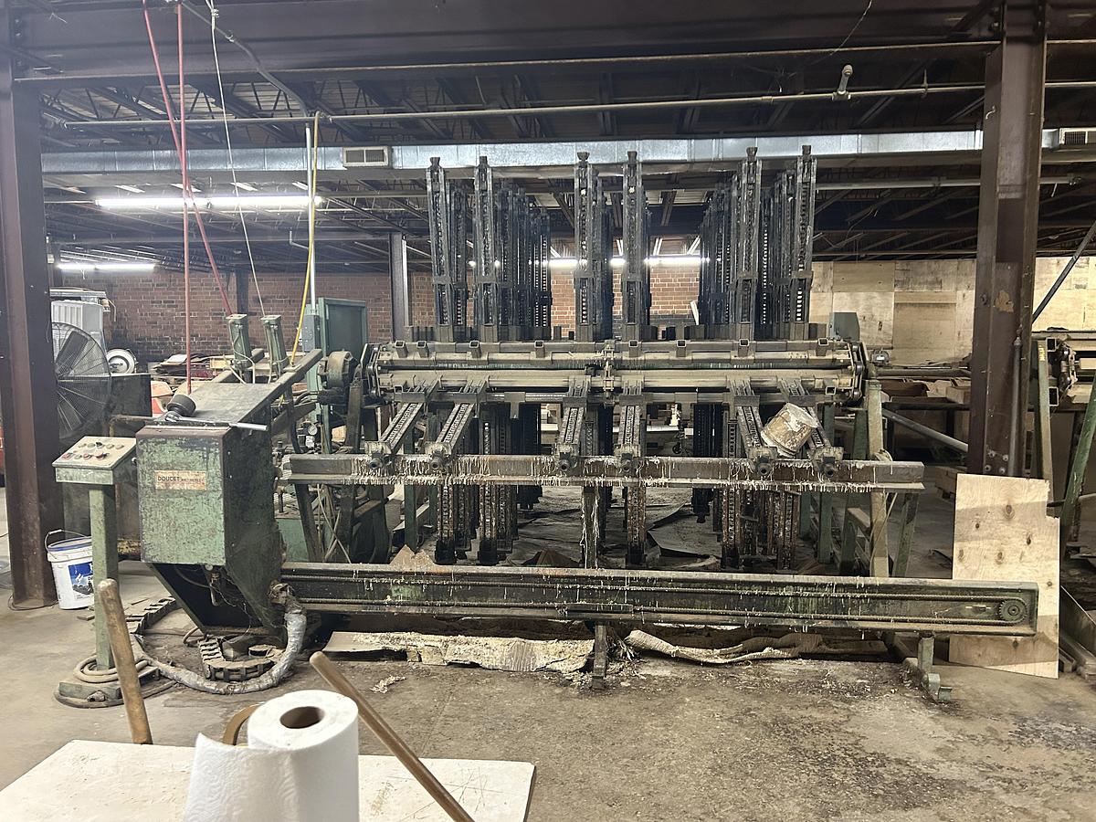 Used DOUCET CLAMP CARRIER