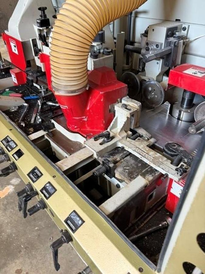 Used WEINIG UNIMAT-GOLD 6-HEAD MOULDER