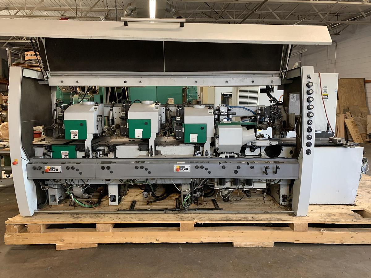 Used WEINIG POWERMAT-1000, 12", 7-HEAD MOULDER
