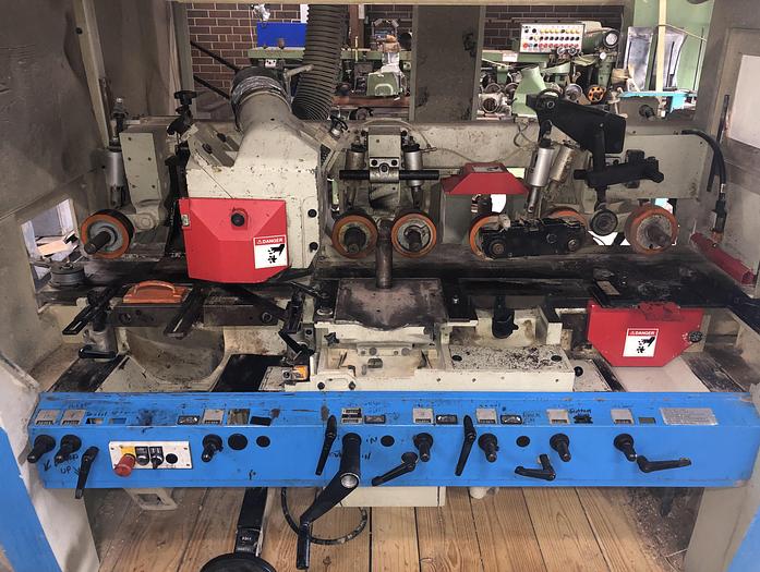 Used WEINIG UNIMAT-25E AUTOMATIC 5-SPINDLE FEED-THROUGH MOULDER