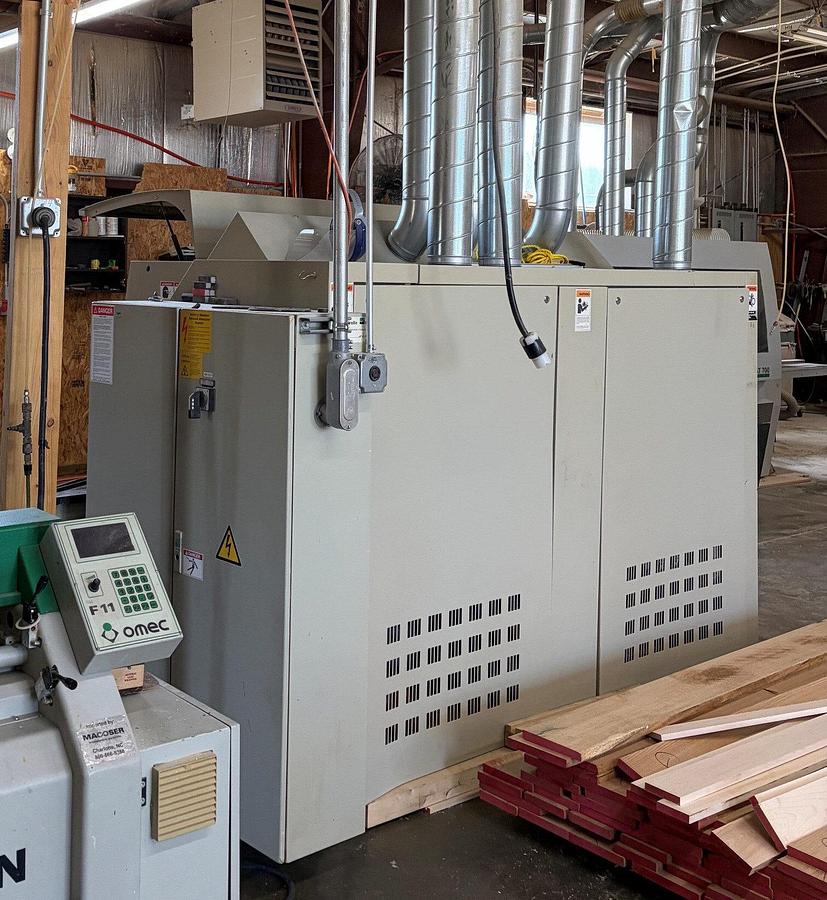 Used WEINIG UNIMAT-GOLD 6-HEAD MOULDER