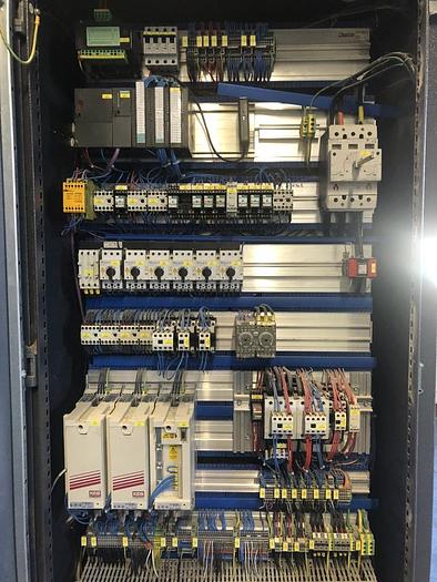 Used WEINIG RAIMANN PROFIRIP KR-310-M GANG RIPSAW WITH (2) MOVING BLADES WITH A RAIMANN VALUE RIP IV GANG RIPSAW INFEED SYSTEM