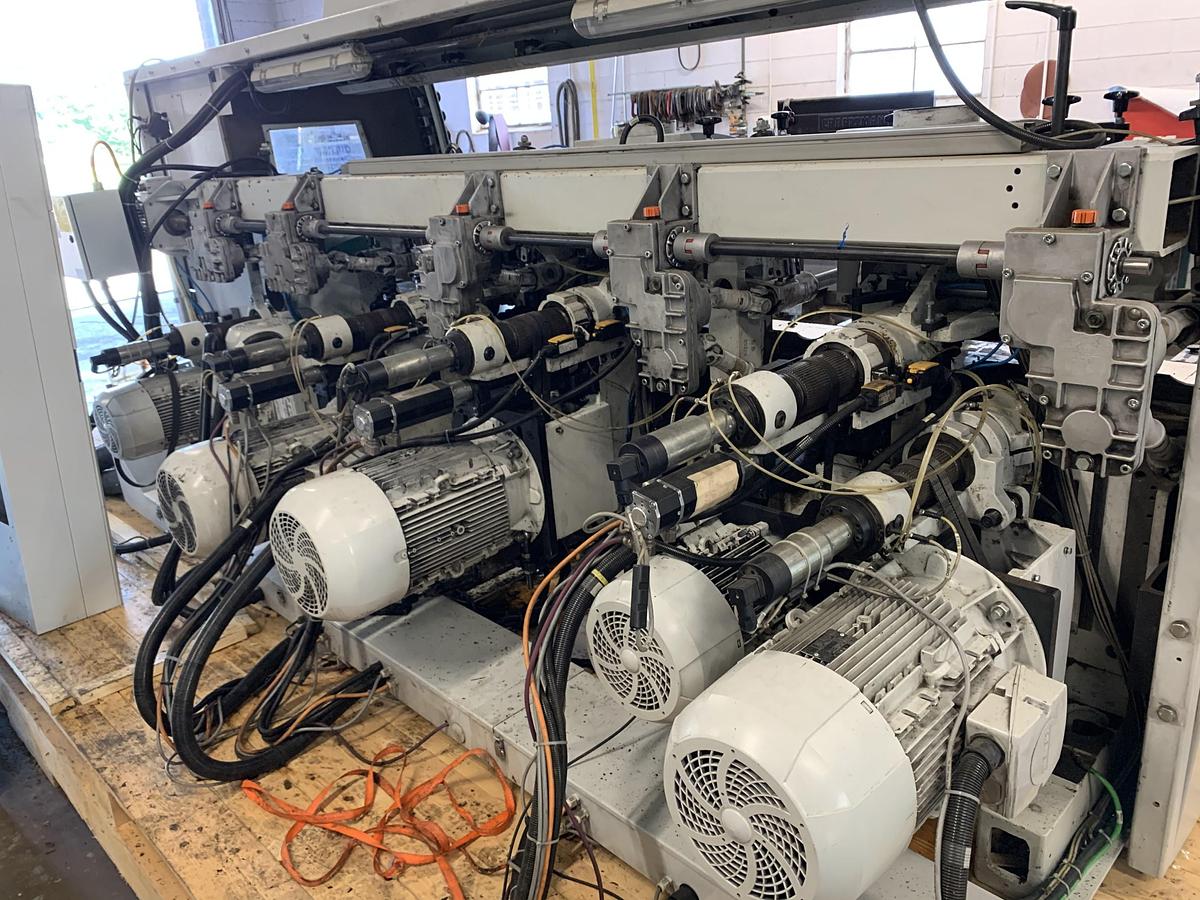 Used WEINIG POWERMAT-1000, 12", 7-HEAD MOULDER