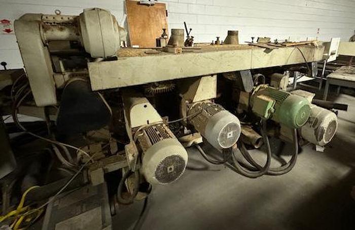 Used WEINIG H-22-BL, 4-HEAD VERTICAL SPLITTING MOULDING