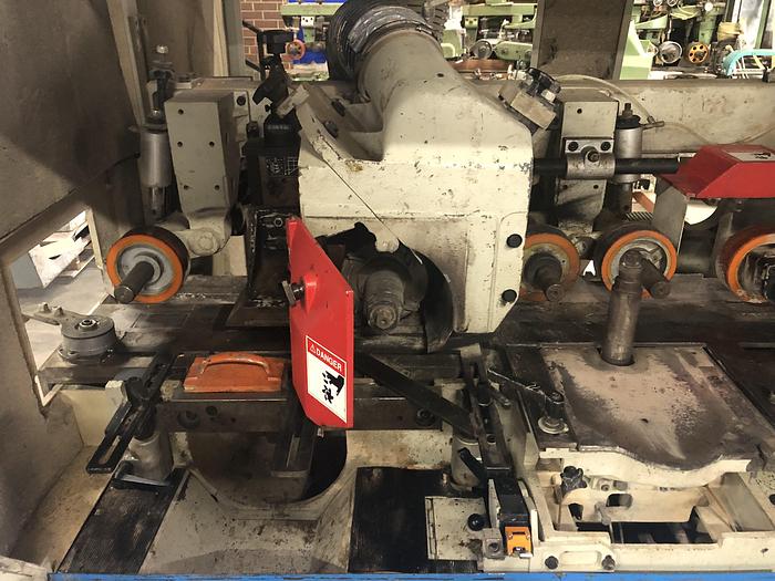 Used WEINIG UNIMAT-25E AUTOMATIC 5-SPINDLE FEED-THROUGH MOULDER