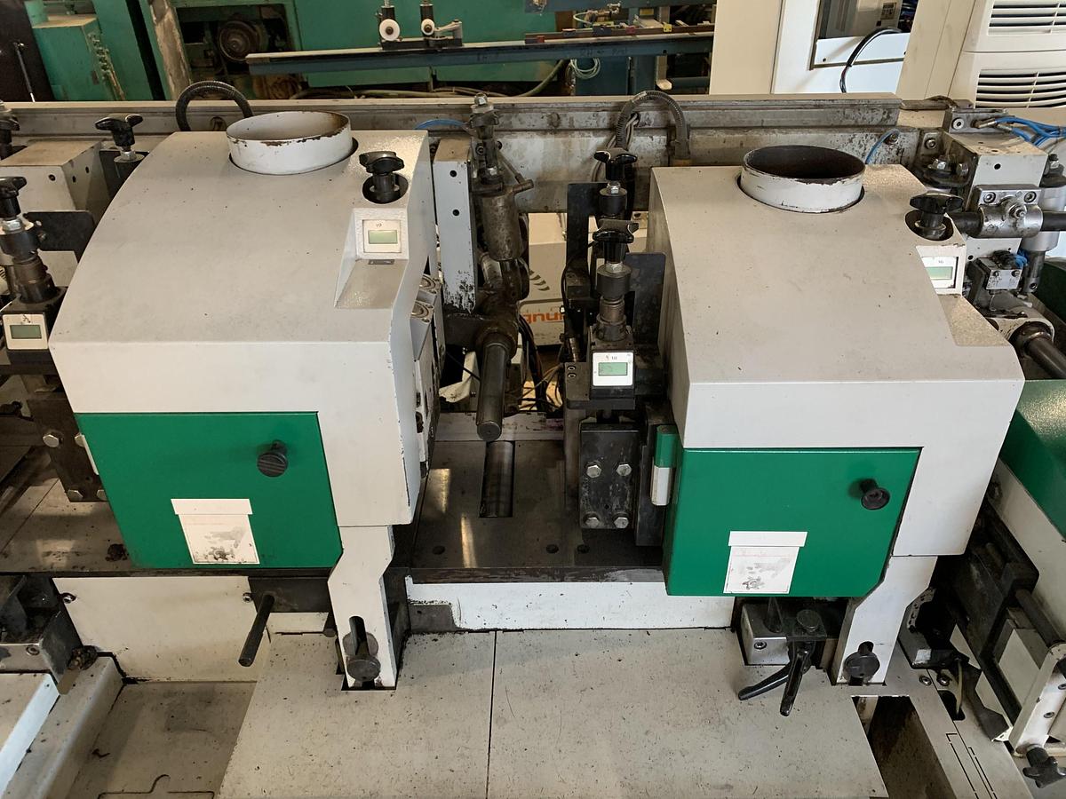 Used WEINIG POWERMAT-1000, 12", 7-HEAD MOULDER