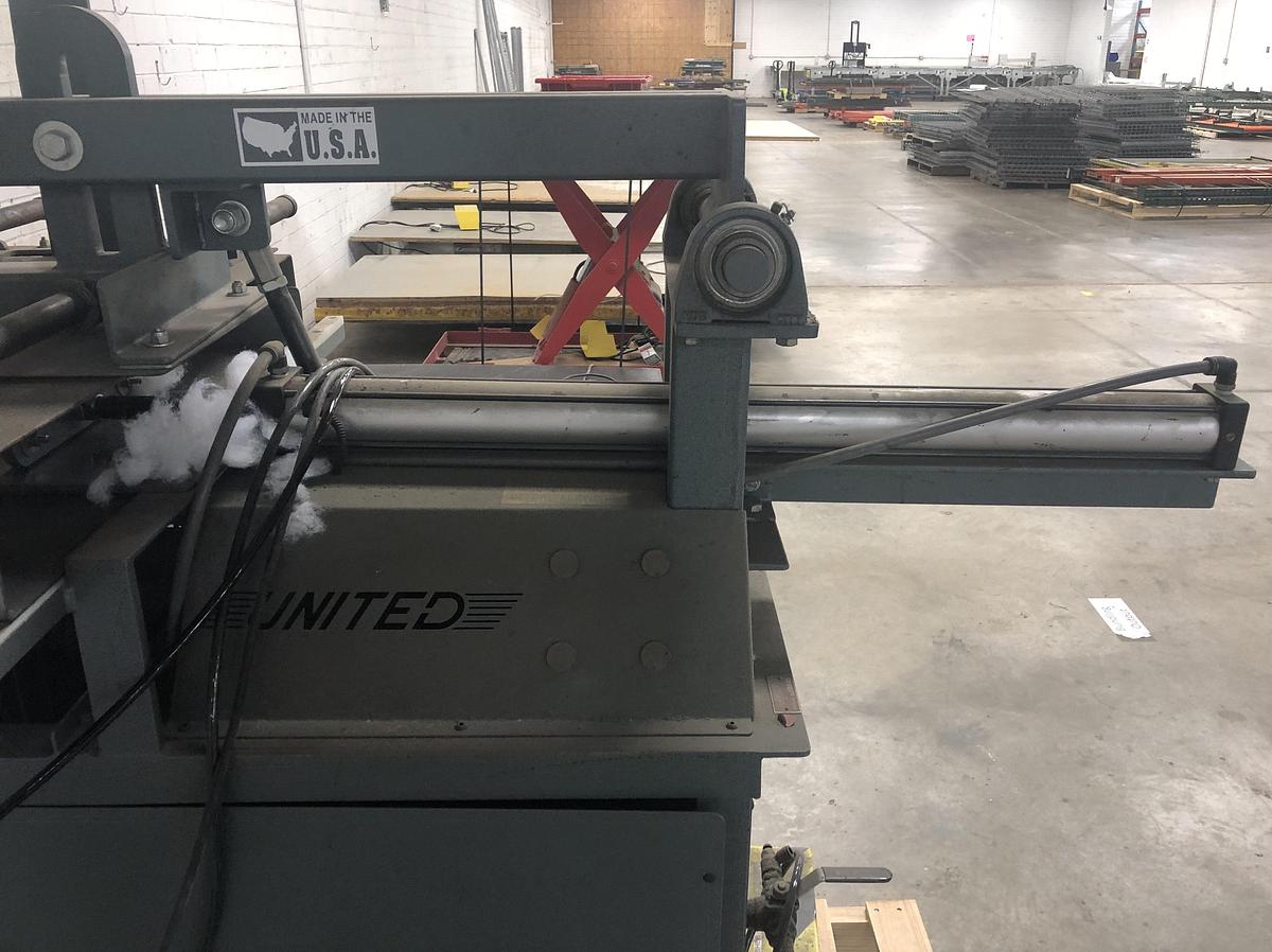 Used UNITED UM-887HD CUSTION STUFFING MACHINE W/SAFETY FENCING