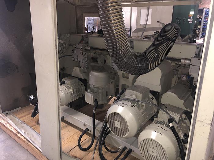 Used WEINIG UNIMAT-25E AUTOMATIC 5-SPINDLE FEED-THROUGH MOULDER