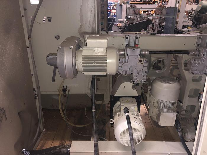 Used WEINIG UNIMAT-25E AUTOMATIC 5-SPINDLE FEED-THROUGH MOULDER