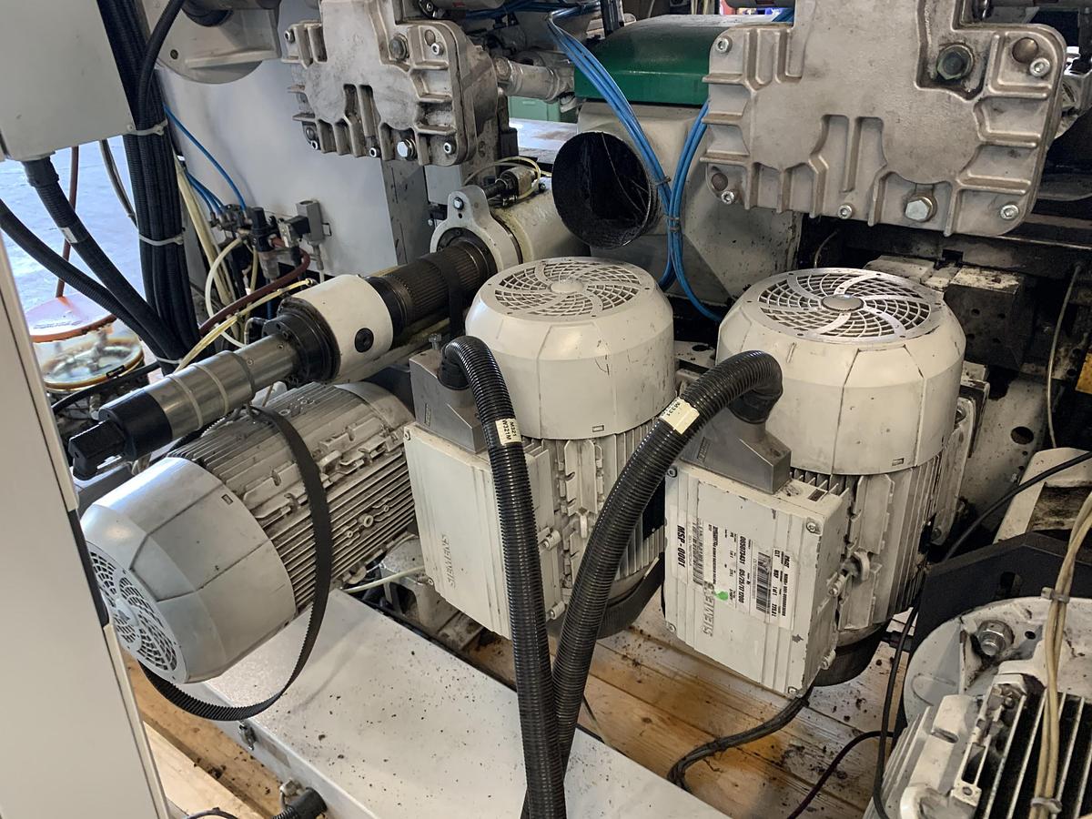 Used WEINIG POWERMAT-1000, 12", 7-HEAD MOULDER