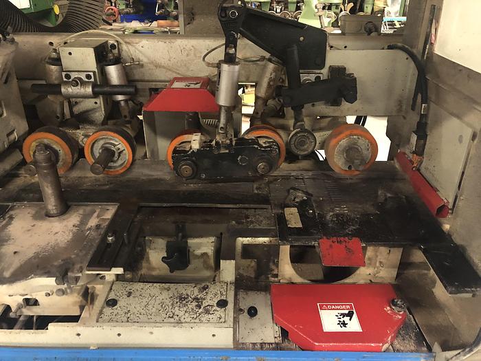 Used WEINIG UNIMAT-25E AUTOMATIC 5-SPINDLE FEED-THROUGH MOULDER