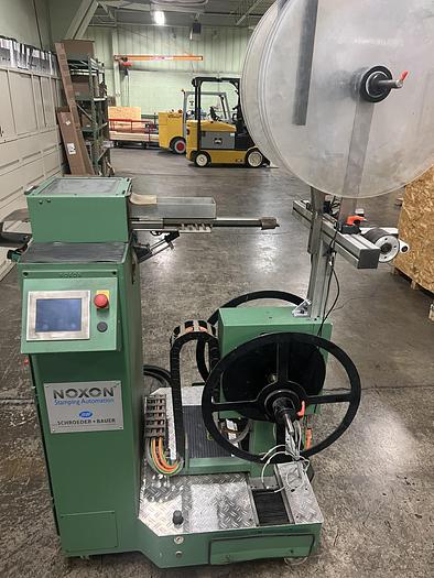 Used NOXON Automatic Single Track Winder Model SW 1024 - With Paper Interleaf for winding