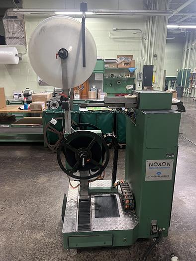 Used NOXON Automatic Single Track Winder Model SW 1024 - With Paper Interleaf for winding