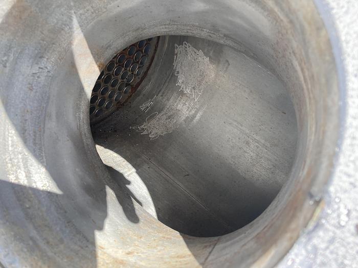 Used Used Rubicon Industries vertical approximately 100 square foot 304 stainless steel shell and tube Heat Exchanger