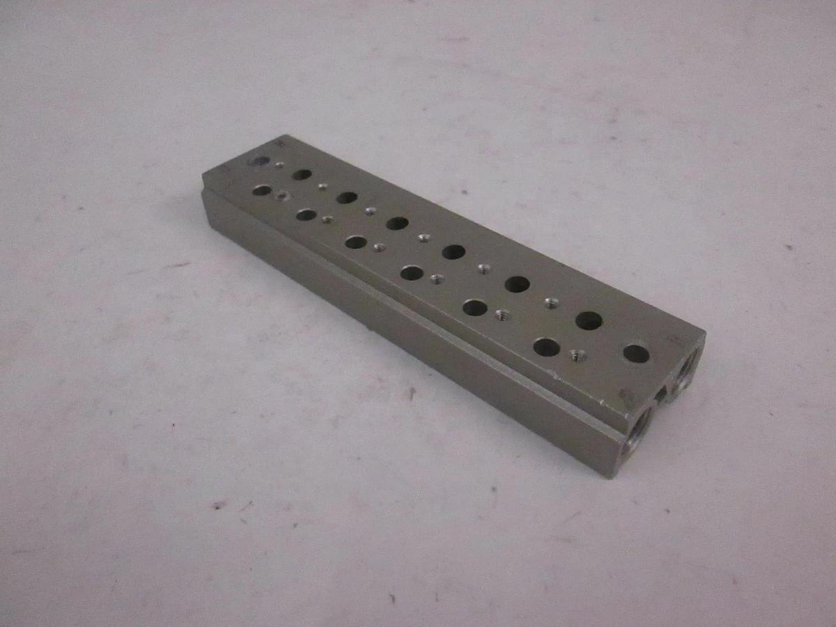 Used SMC 6 Position Manifold Block for Valve, Used
