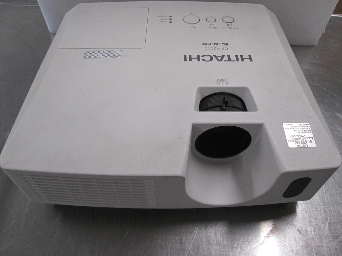 Used Hitachi Model: CP- X2010, LCD projector 100-120v/ 220-240v , 50/60Hz 3.7-1.0A