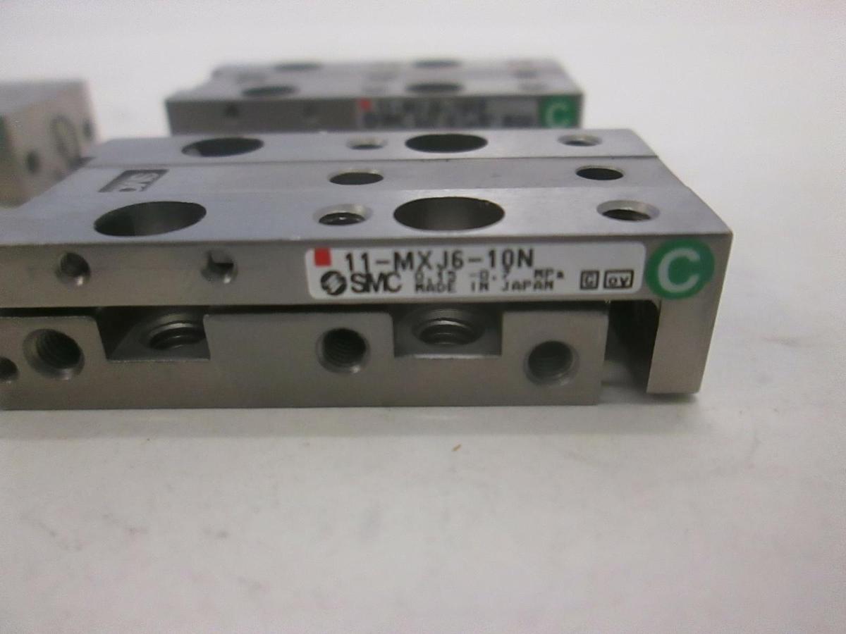 Used SMC, Slide Actuator, 11-MX14-5 (2), 11-MXJ6-10CP (1) and 11-MXJ6-10N (1), Used