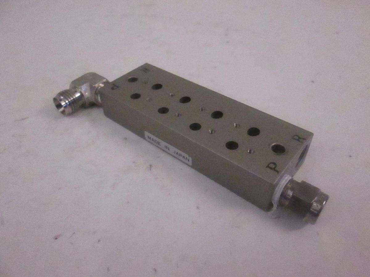 Used SMC 4 Position Manifold Block for Valve, Used