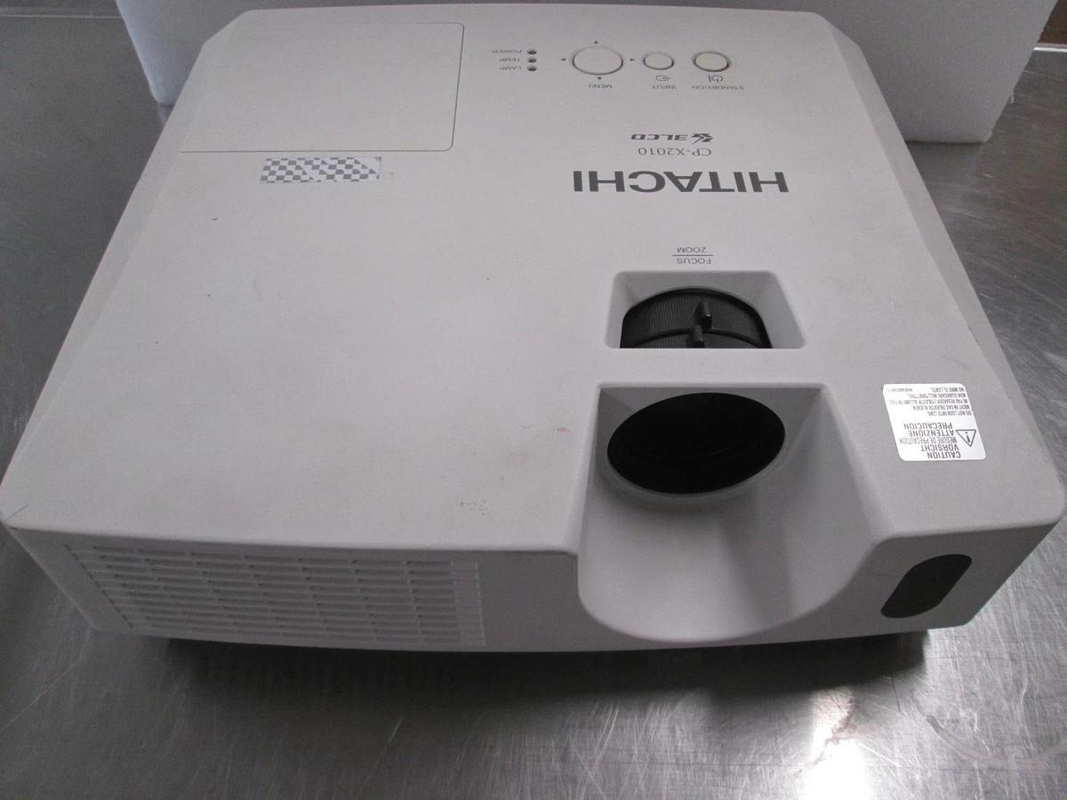 Used Hitachi Model: CP- X2010, LCD projector 100-120v/ 220-240v , 50/60Hz 3.7-1.0A
