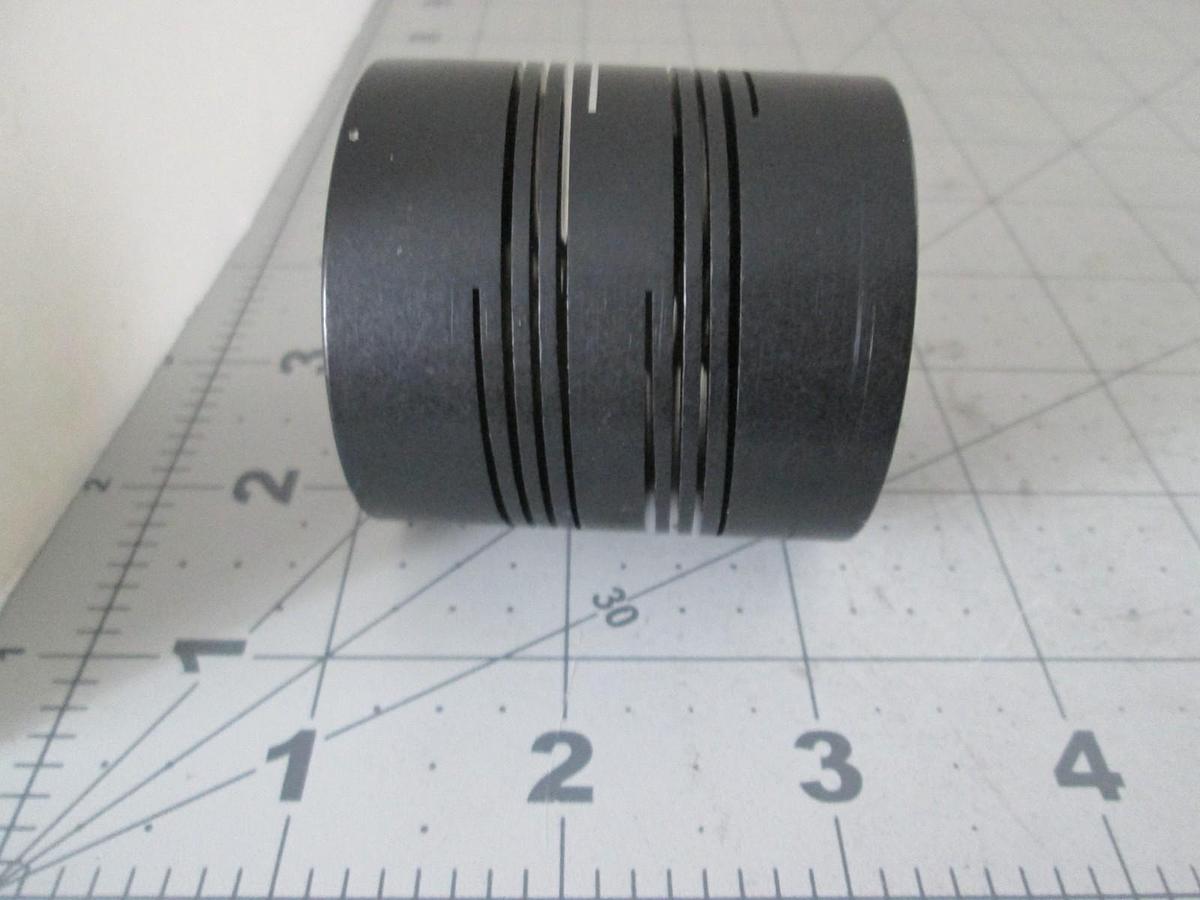 Used Rocom Precision, BTOOO200-C12mm-C14mm, Flexible Coupling, 1.97" x 2", New