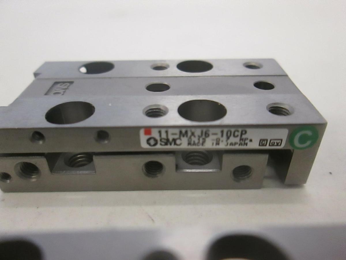Used SMC, Slide Actuator, 11-MX14-5 (2), 11-MXJ6-10CP (1) and 11-MXJ6-10N (1), Used