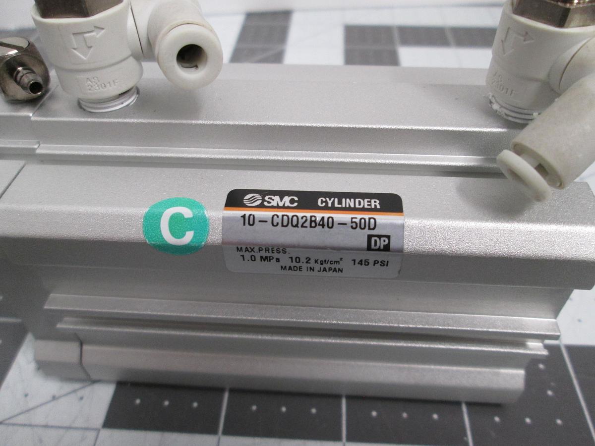 Used SMC 10-CDQ2B40-50D Clean Series Compact Pneumatic Cylinder Speed Controls