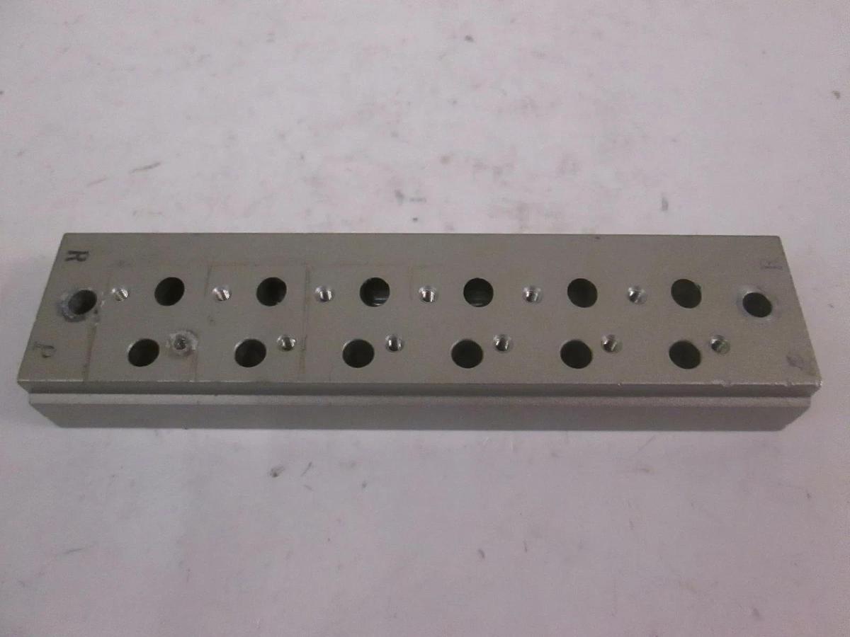 Used SMC 6 Position Manifold Block for Valve, Used