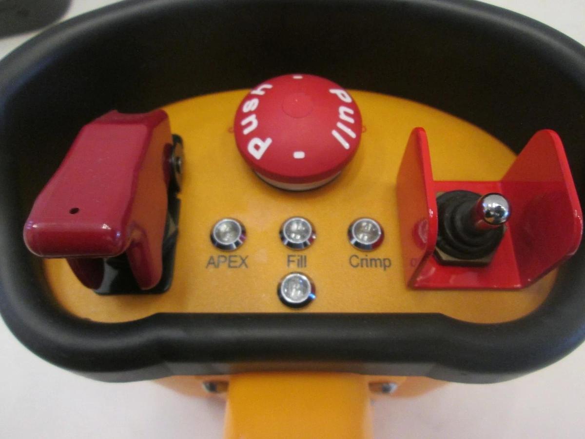 Used Hetronic, CS 458 TR-1 Pistol Grip Transmitter w/ VersaPak Battery Charger, Used