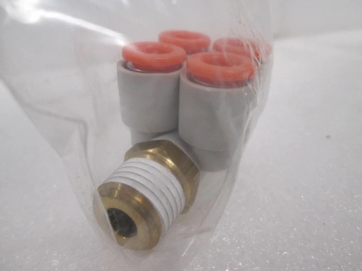 Used SMC, 1/4" 4-Port Fitting, 206-7302, Used