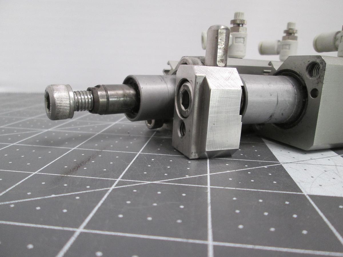 Used SMC MKA20-20L Rotary Clamp Pneumatic Cylinder Lot of 2 with Speed Controls