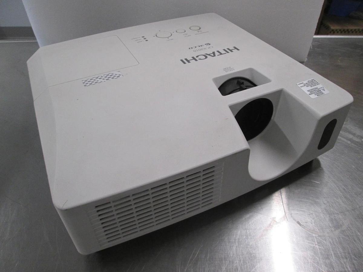 Used Hitachi Model: CP- X2010, LCD projector 100-120v/ 220-240v , 50/60Hz 3.7-1.0A