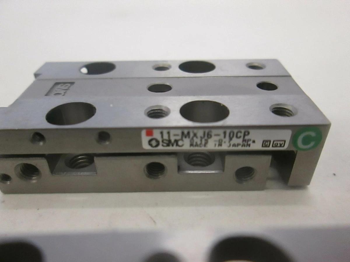 Used SMC, Slide Actuator, 11-MXJ4-5 (2), 11-MXJ6-10CP (1) and 11-MXJ6-10N (1), Used