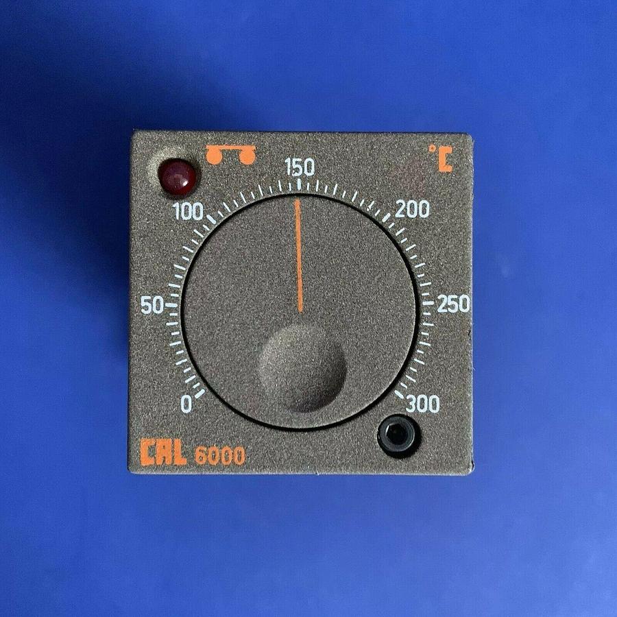 Used OMEGA CAL 6000 Series, 6102-J-0/300C, Temperature Controller w/ Base, Used