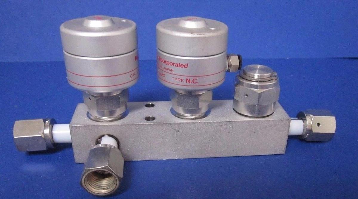 Used Fujikin TEL 4 Port Block w/ 2 Pneumatic Valves, O.P. 3.5-kgf/cm2G NC/NC, Used