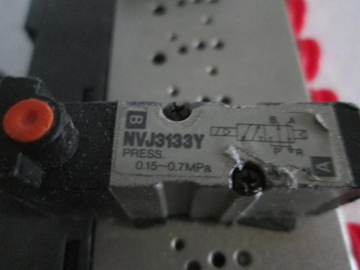 Used SMC, 12 Position Manifold Block Valve Assy w/ 2 NVJ3133Y Valves, Used