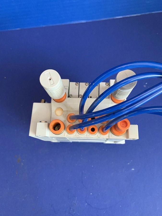 Used SMC Solenoid Valve Assembly w/ (3) VQ1201N-5 Valves and Manifold