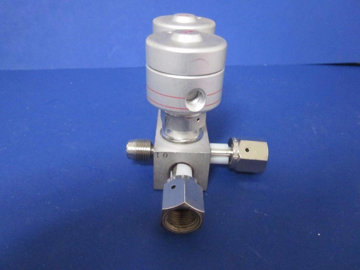 Used Fujikin TEL 4 Port Block w/ 2 Pneumatic Valves, O.P. 3.5-kgf/cm2G NC/NC, Used