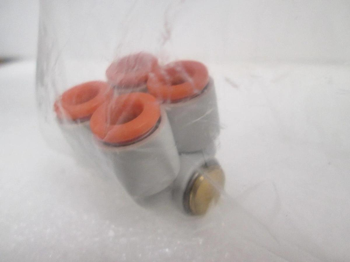 Used SMC, 1/4" 4-Port Fitting, 206-7302, Used