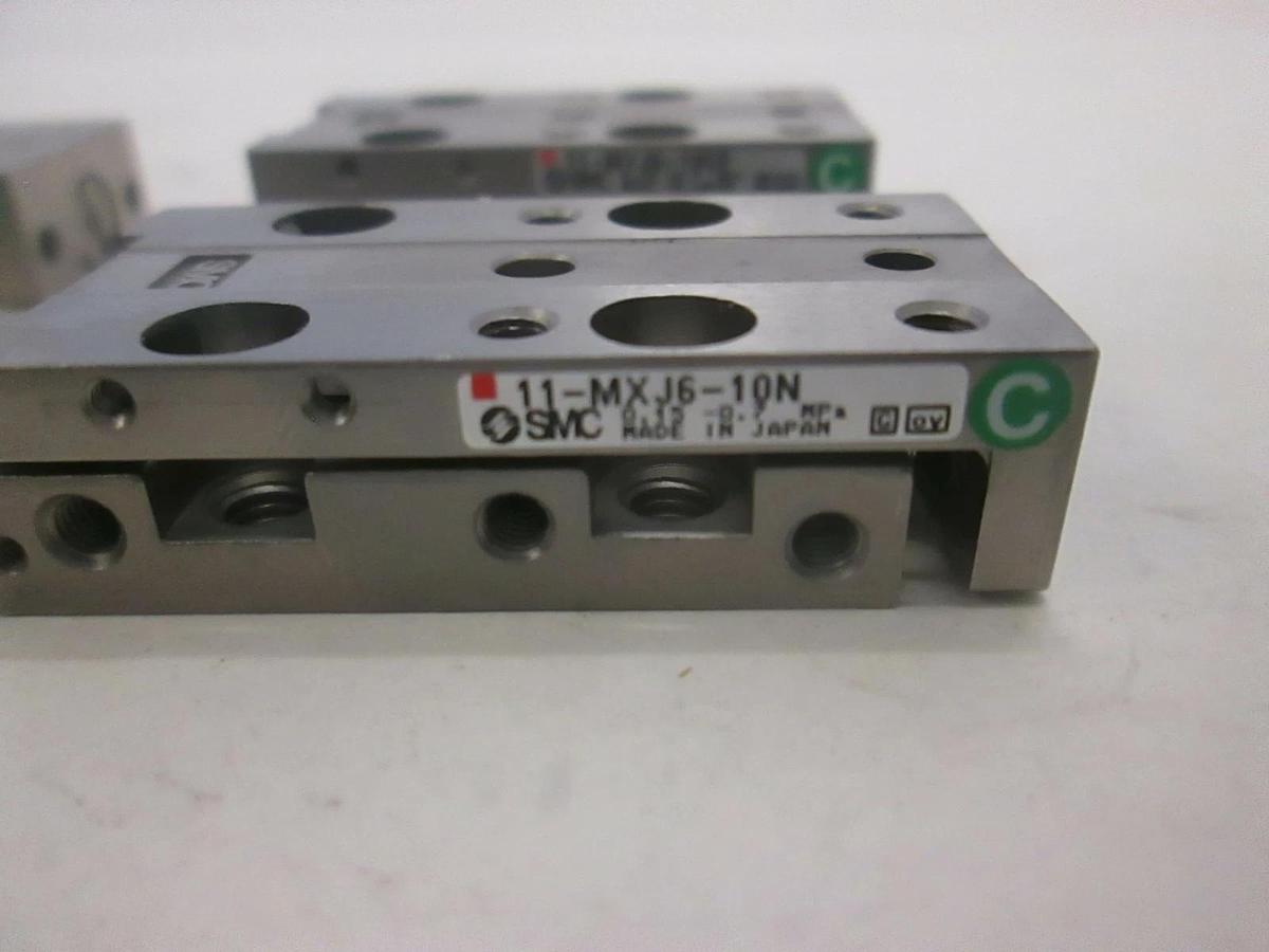 Used SMC, Slide Actuator, 11-MXJ4-5 (2), 11-MXJ6-10CP (1) and 11-MXJ6-10N (1), Used