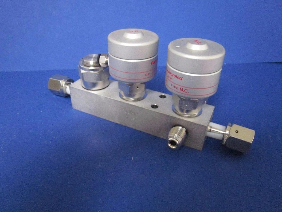 Used Fujikin TEL 4 Port Block w/ 2 Pneumatic Valves, O.P. 3.5-kgf/cm2G NC/NC, Used