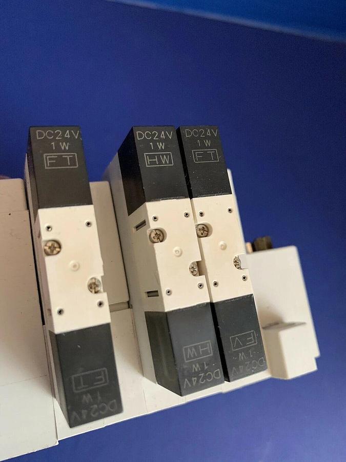 Used SMC Solenoid Valve Assembly w/ (3) VQ1201N-5 Valves and Manifold