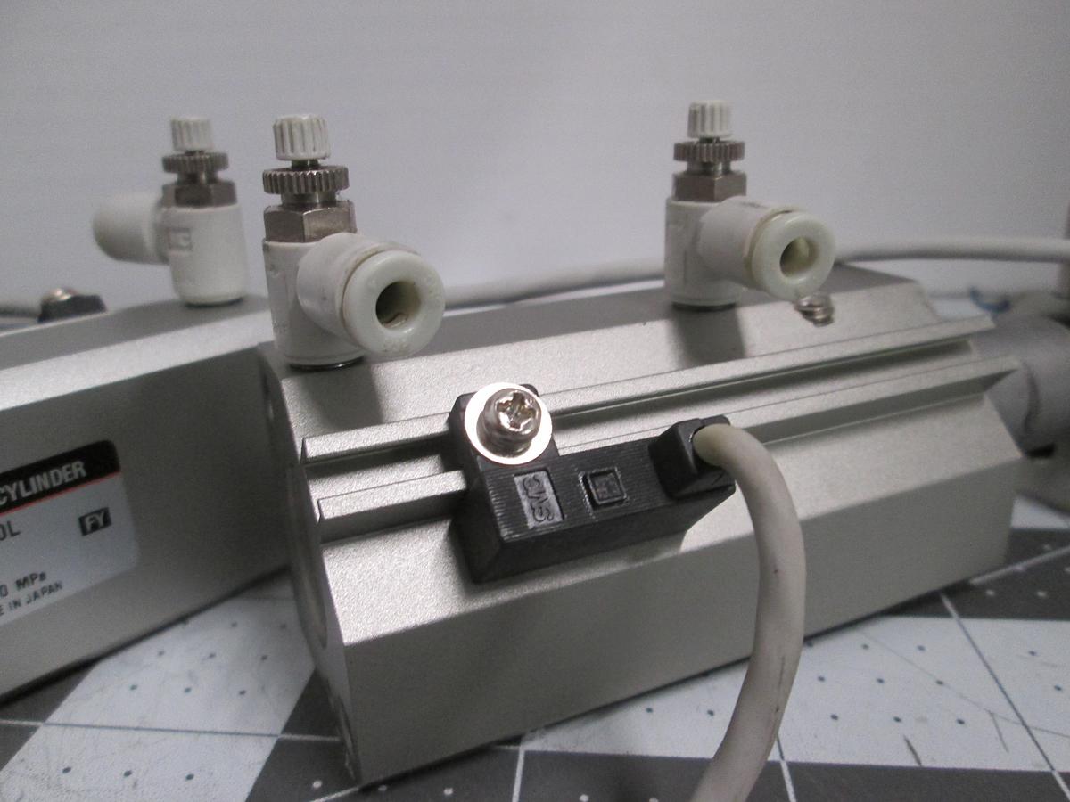 Used SMC MKA20-20L Rotary Clamp Pneumatic Cylinder Lot of 2 with Speed Controls