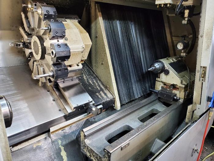Used 2011 OKUMA Genos L400-E CNC Lathe
