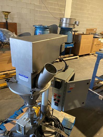 Used Used Hauser Semi-Automatic Powder Auger Filler