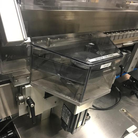 Used NJM Autocolt III - High Speed Pressure Sensitive Wraparound Labeler